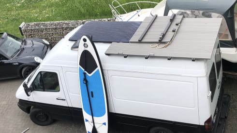 Campino – Camper with electric motorcycle + stand-up paddleboard - 25% discount possible