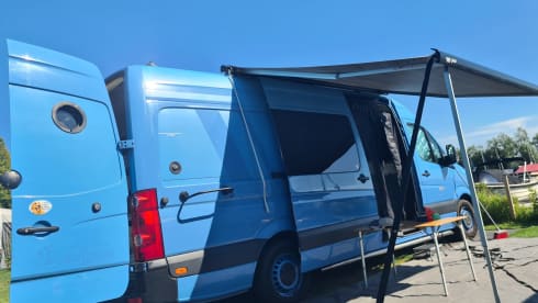 De brilsmurf – 2p Volkswagen bus from 2016/2023