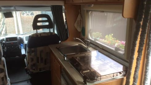 Dinghy  – Very neat and cozy camper for 2 people with sufficient storage space.