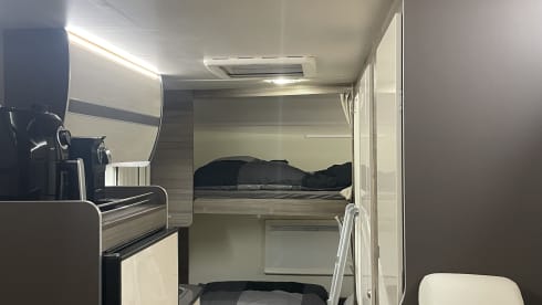 Spacious 7-person Rimor alcove family camper from 2019