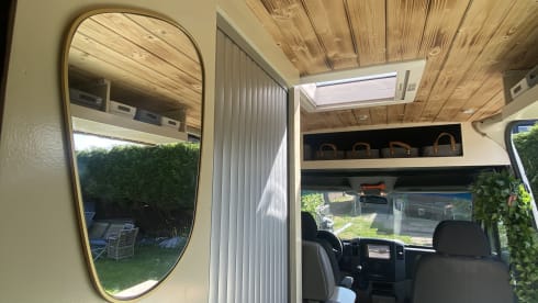 Home is where we park it! – Cool, fresh, self-sufficient 4 person bus camper.