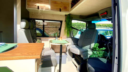 Home is where we park it! – Cool, fresh, self-sufficient 4 person bus camper.