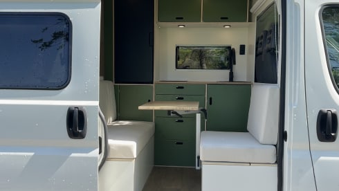 Trendy 2-person camper with solar panels