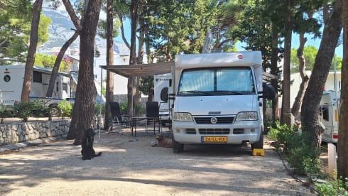 Bürstner Family Camper 4 persons, with bicycle carrier.