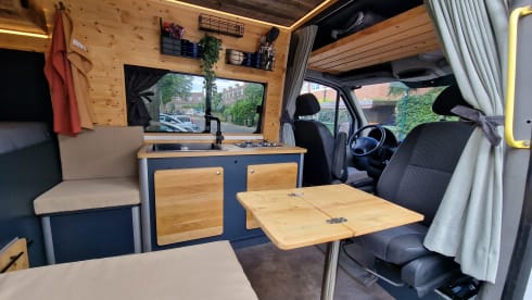 Tough 2 person bus camper - Off-grid