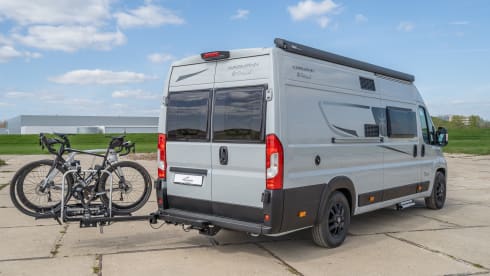 Off the Grid 1 – Brand new 6.36 bus camper with automatic transmission and solar panel, "off the grid no. 1"
