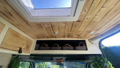 Home is where we park it! – Cool, fresh, self-sufficient 4 person bus camper.