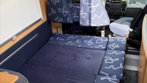 Neat, reliable, and compact 4-seater semi-integrated motorhome from 2002