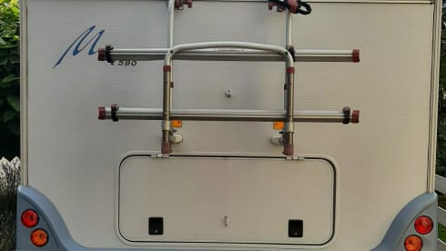 Mr. Blue  – Bürstner Merano with air conditioning and fixed bed 2005