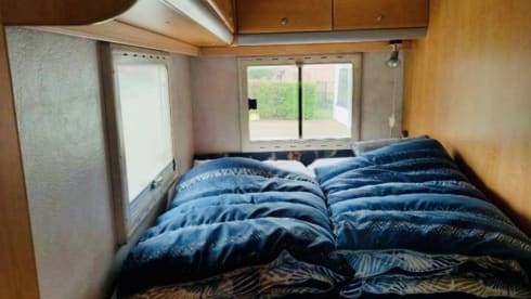 Attractive camper with fixed bed and easy to park