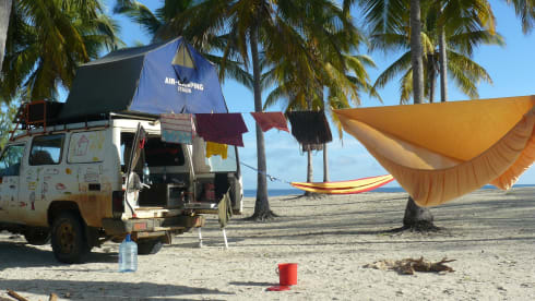 Unique camping cruiser 4x4 with roof tent