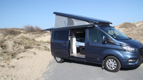 Dries – Ford Nugget plus 4p (push roof) ideal for road trip/free camping