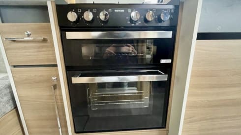 Hugo  – Luxury 4 berth Bailey Adamo with drop down beds and large living spaces. 