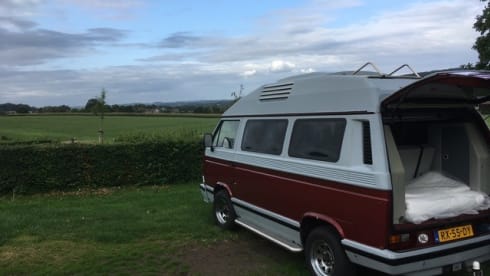 Original retro Volkswagen T3 Dehler with complete camping equipment.