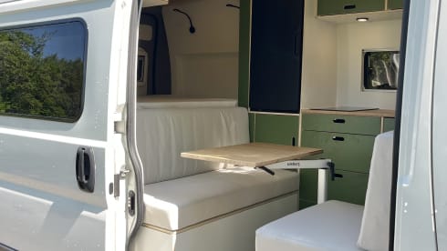 Trendy 2-person camper with solar panels