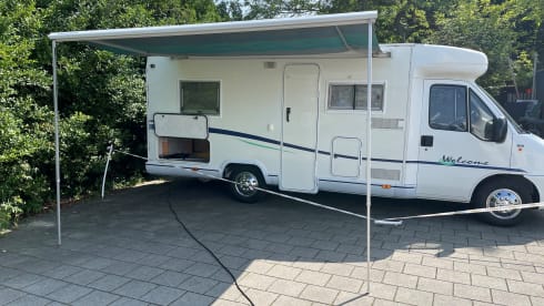 Attractive camper with fixed bed and easy to park