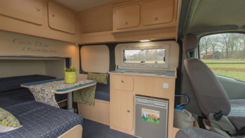 Type 4 – Compact bus camper with a large bed