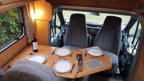 Comfortable camper with single beds and air conditioning