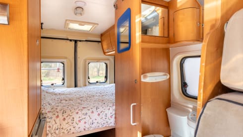 2 person bus camper with fixed bed and sanitary facilities