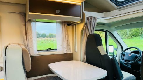 Koosje – Luxury Camper (5 persons) Lengthwise and lifting bed L-seat