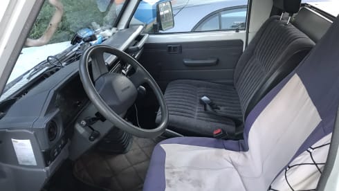 Unique camping cruiser 4x4 with roof tent