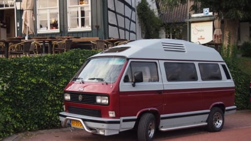 Original retro Volkswagen T3 Dehler with complete camping equipment.