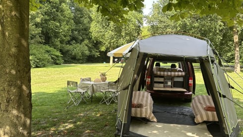 Super nice Volkswagen Caddy Maxi campervan from 2011 with tent, 4p