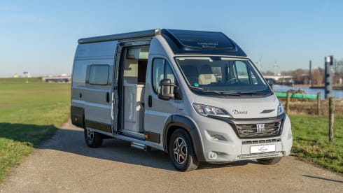 Off the Grid 1 – Brand new 6.36 bus camper with automatic transmission and solar panel, "off the grid no. 1"