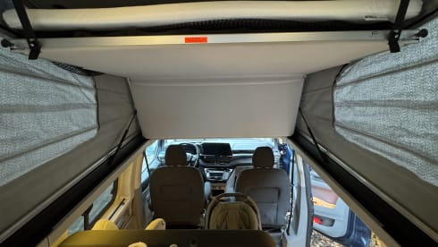 Nuggie – Fourgon aménagé Ford Nugget '25 bien conçu avec 4 couchages confortables