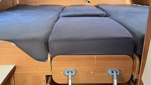 2p Carado semi-integrated from 2013 with single beds. 