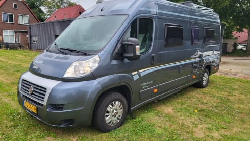 Neat camper van with length beds and solar panels