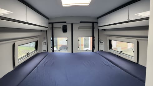 Fiat Adria 640 bus camper with large garage and fold-down bed 