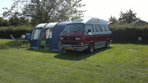 Original retro Volkswagen T3 Dehler with complete camping equipment.