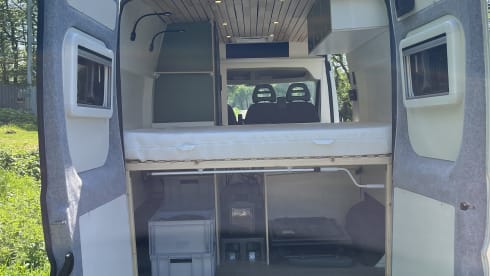 Trendy 2-person camper with solar panels