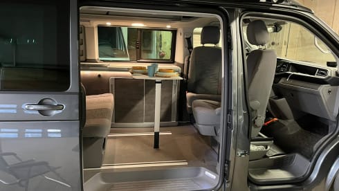 Grijze VW California – Brand new VW California T6 Camperbus from 2021. Possibly with motor trailer.