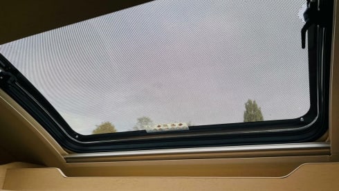 Koosje – Luxury Camper (5 persons) Lengthwise and lifting bed L-seat