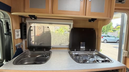 Neat, reliable, and compact 4-seater semi-integrated motorhome from 2002