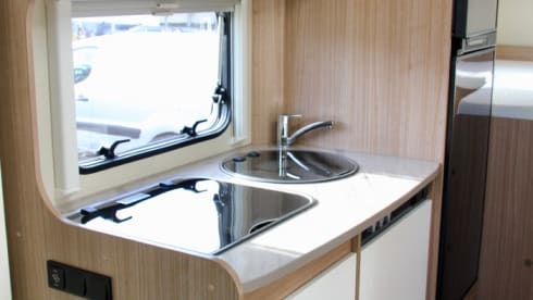 3 – Spacious 2-person camper with single beds or king-size bed!