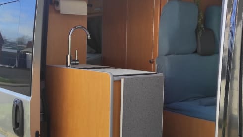 Cosy and compact 2p Ford Pösll campervan.