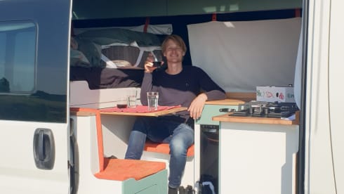 Compact off-grid Peugeot Boxer with length bed for 2 people