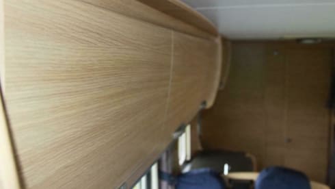 Spacious furnished family camper with bunk beds and air conditioning