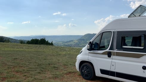 Experience the freedom of a compact bus camper