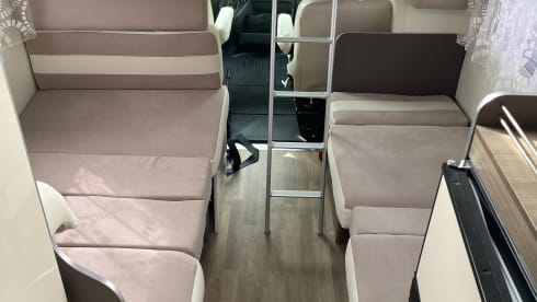 Spacious 7-person Rimor alcove family camper from 2019