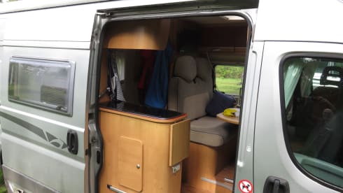 2 person bus camper with fixed bed and sanitary facilities