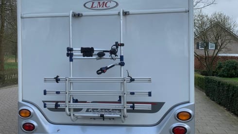 4p LMC semi-integrated with awning, air conditioning and cruise control.