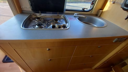 Family camper with XL garage and a cozy sitting area! (6Person)