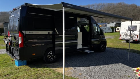 Fiat Adria 640 bus camper with large garage and fold-down bed 