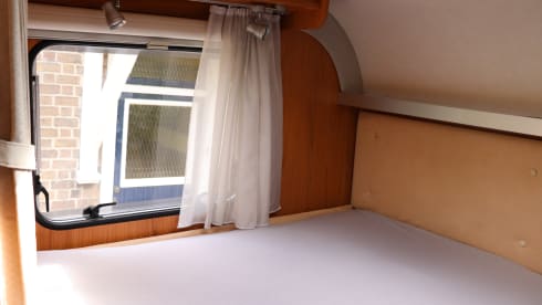 Camper with top layout