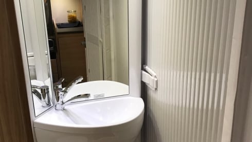 13/21 – Luxurious, complete camper with length beds and a pull-down bed!