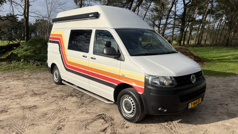 Retro Volkswagen Bus with bicycle carrier & awning